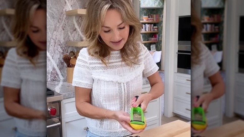 Giada De Laurentiis grating a lemon