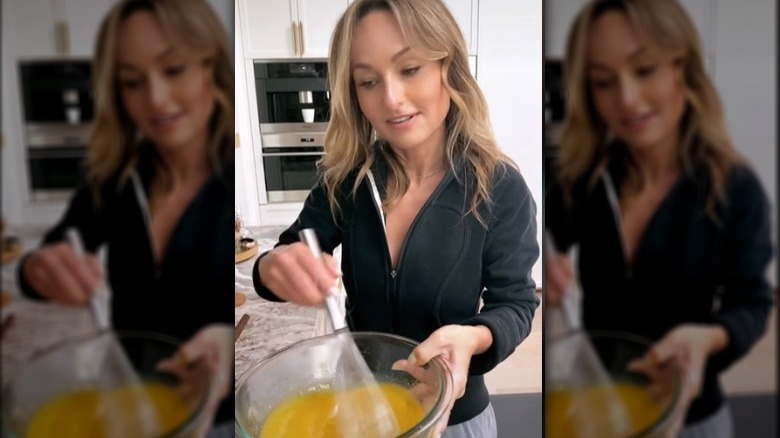 Giada De Laurentiis whisking eggs