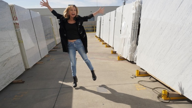 Giada de Laurentiis looking at marble and granite