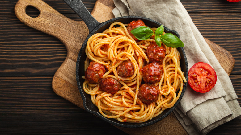 Spaghetti and meatballs in pan