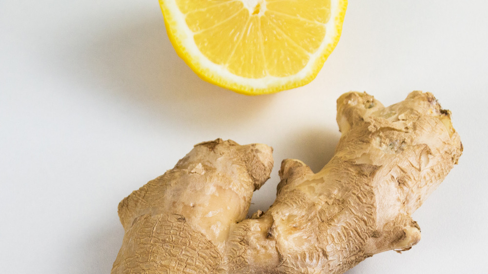 Ginger and lemon on white background