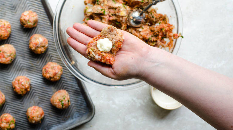 Forming meatballs by hand