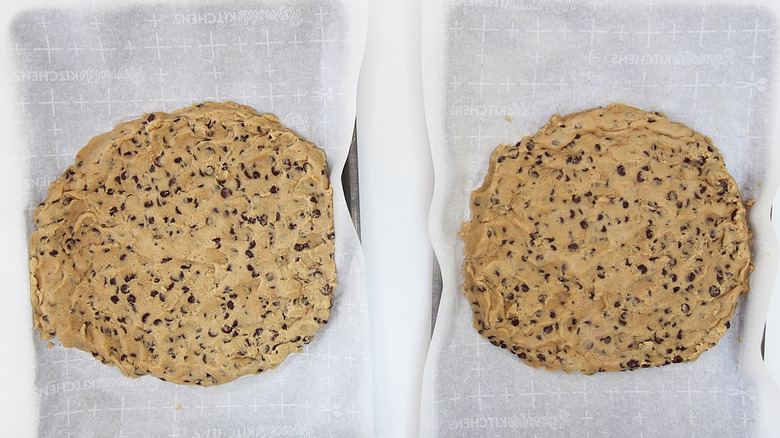 two giant cookie rounds on parchment paper