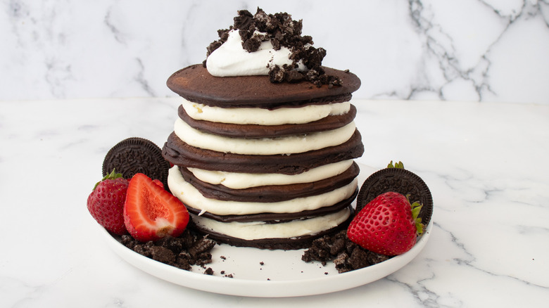 stacked oreo pancakes with strawberries