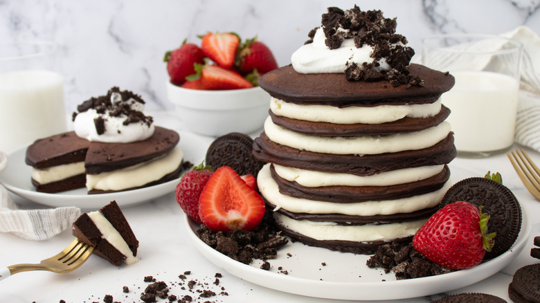 stacked oreo pancakes with strawberries