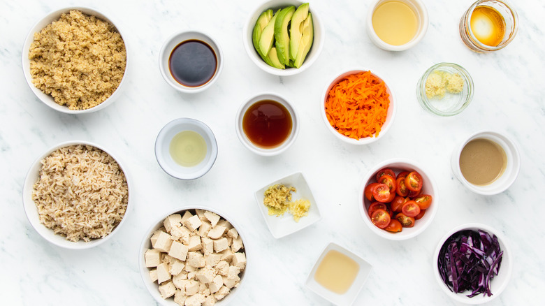 Tofu grain bowl ingredients in bowls