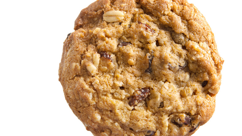 Oatmeal raisin cookie resembling Forget-me-nots girl scout cookies