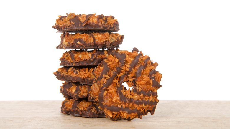 a stack of caramel delites samoas girl scout cookies