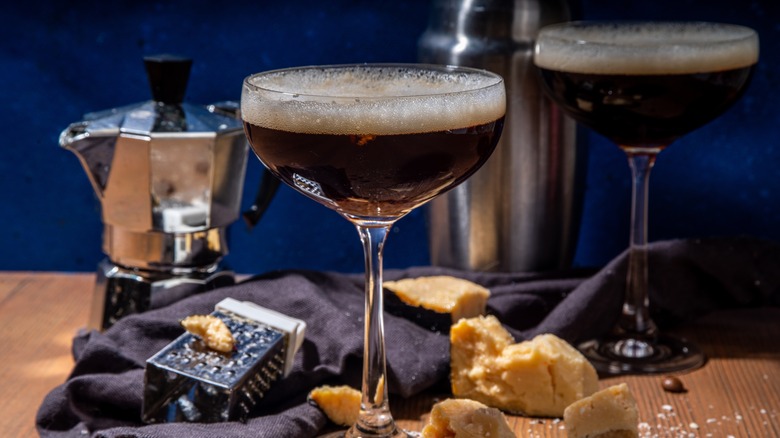 Cheese infused espresso martini with grated parmesan and shaker