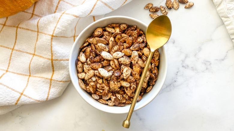 Toasted pumpkin seeds in bowl