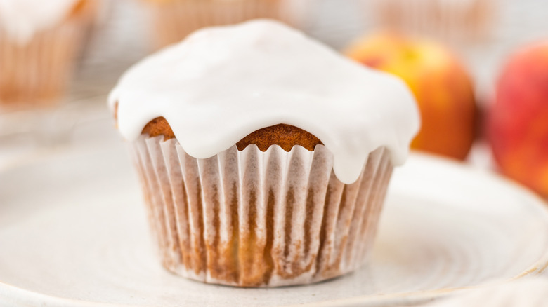 glazed peach muffin on plate