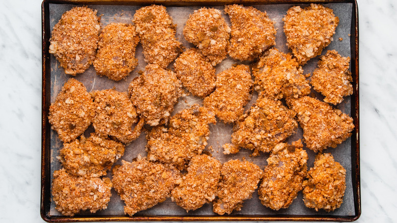 chicken nuggets on baking sheet