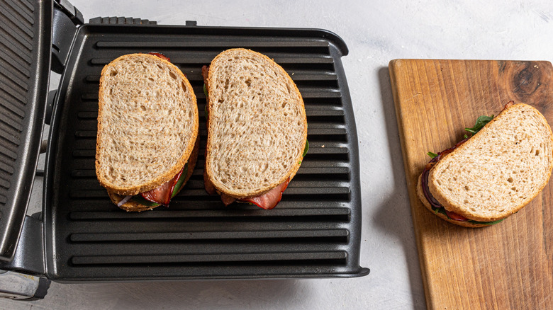 Two sandwiches on a panini press