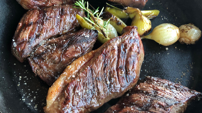 sliced steak on plate