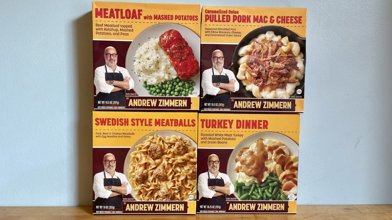 Andrew Zimmern frozen meals stacked on table