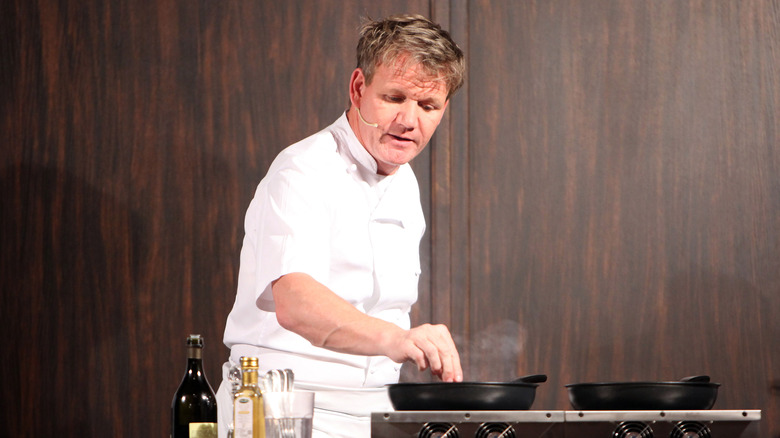 Gordon Ramsay cooking on stage