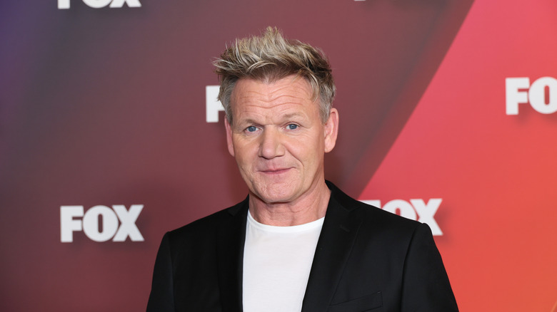 Gordon Ramsay in black blazer and white t-shirt