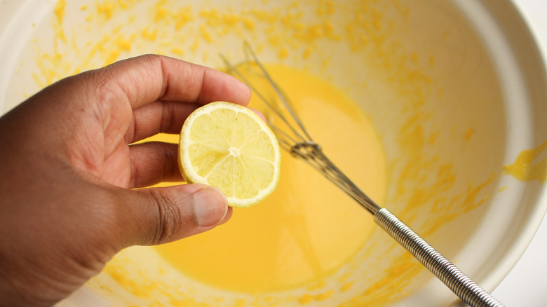 whisking egg yolks and lemon