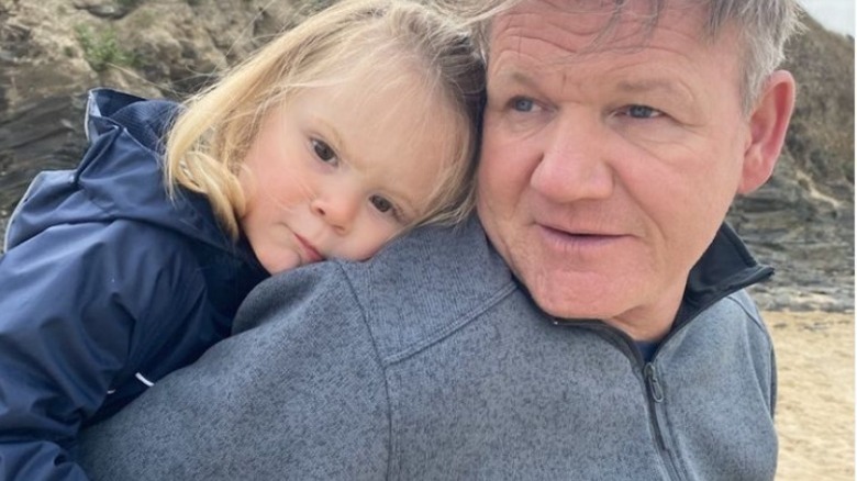 Gordon Ramsay and son on beach