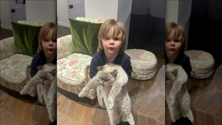 Gordon Ramsay's son holding their cat