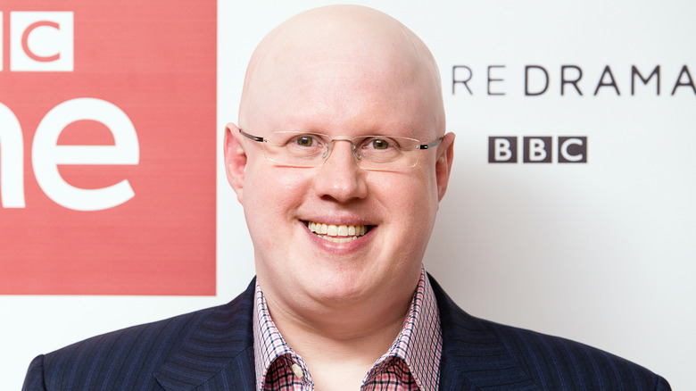 Matt Lucas smiles with glasses