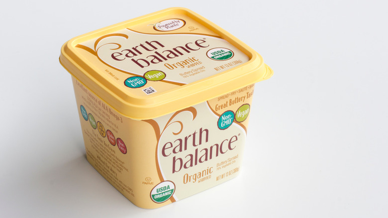 A container of Earth Balance vegan butter