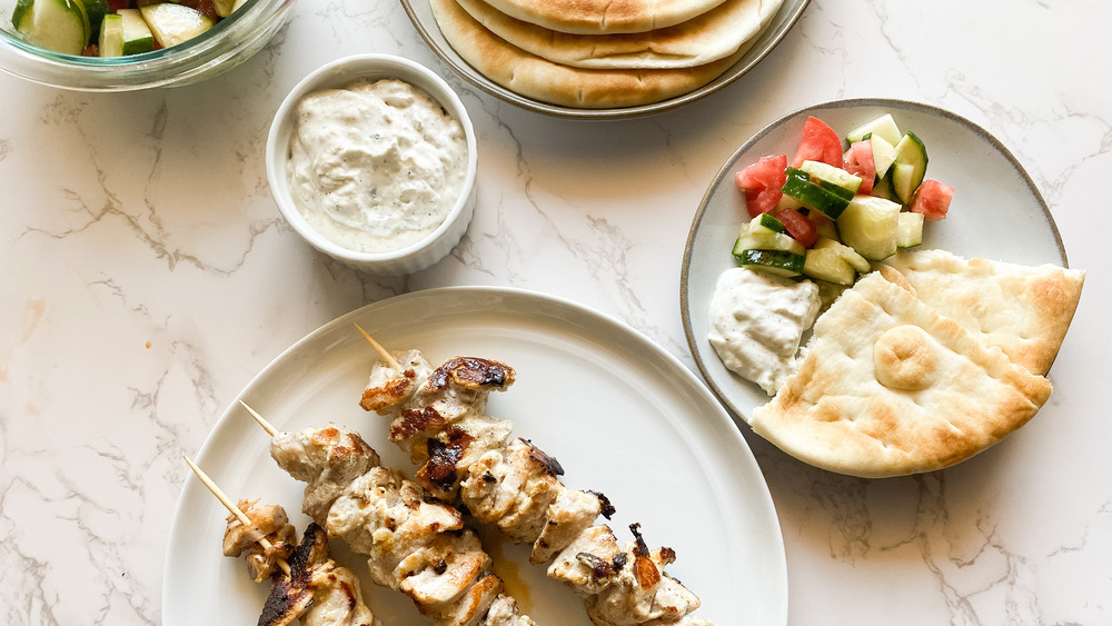 Greek Chicken Souvlaki served on dishes