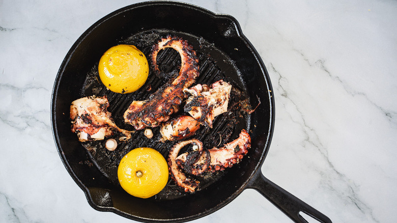 octopus and lemon on grill pan