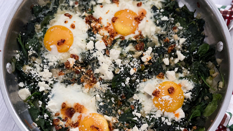 green shakshuka in skillet