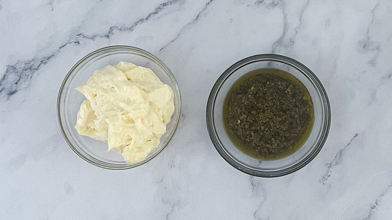 mayonnaise and pesto in bowls