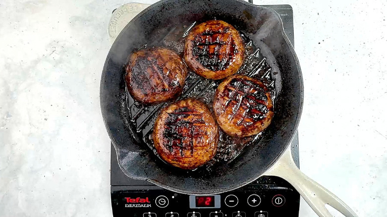 cooked portobello mushrooms in skillet