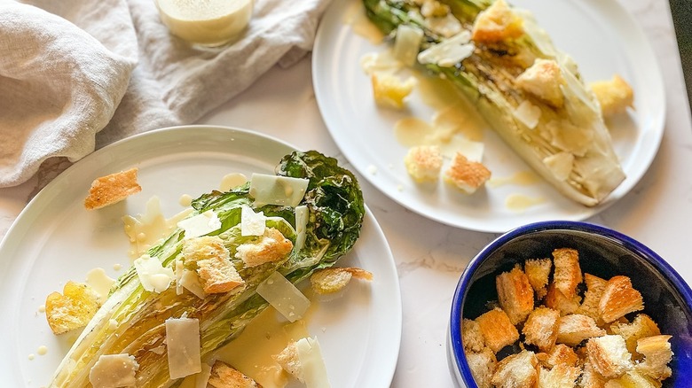 Caesar salad next to croutons