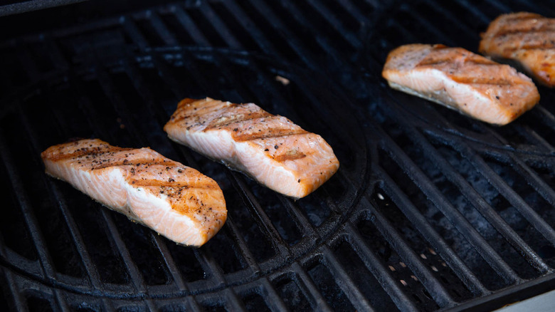 salmon pieces on gas grill