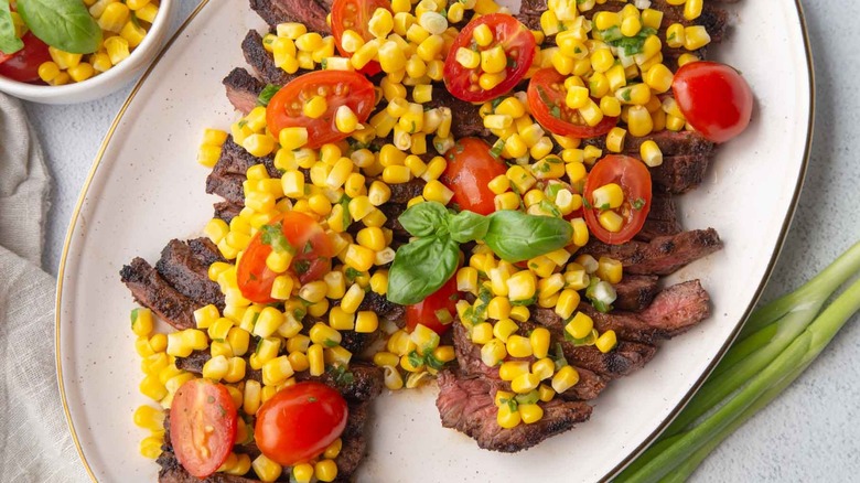 skirt steak with tomato and corn salsa