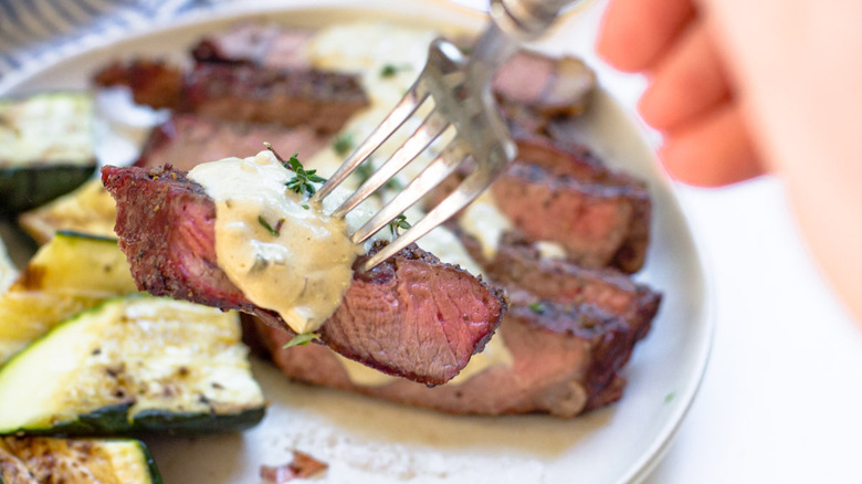 forkful of steak au poivre