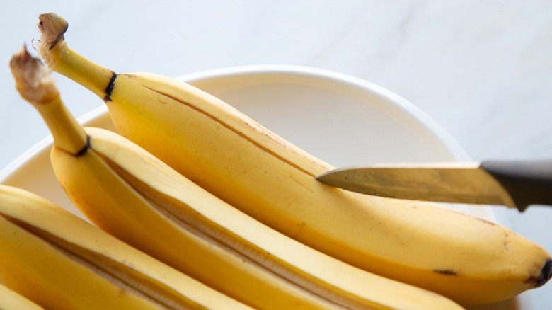 slicing banana peel