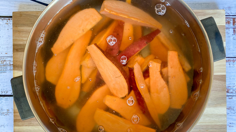 potatoes in pot of water