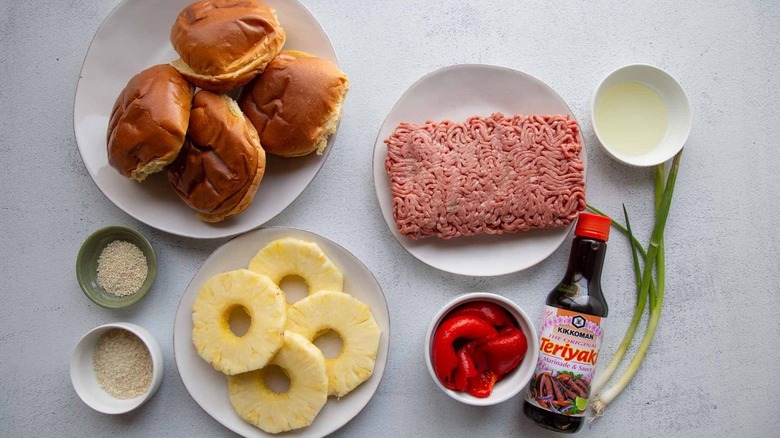 hamburger meat, buns and toppings