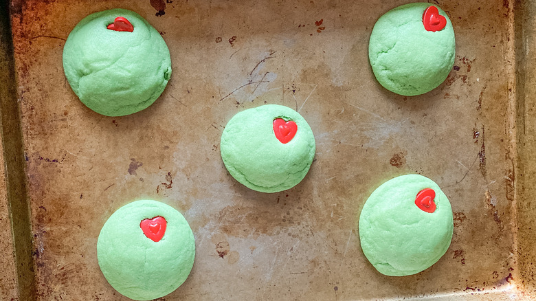 green cookies with heart sprinkles