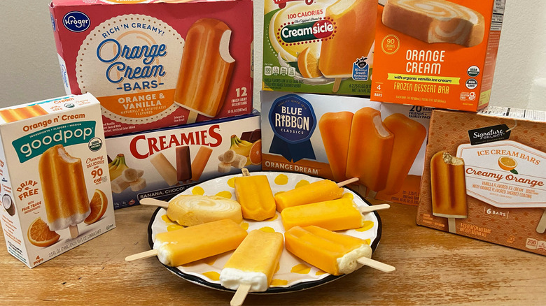 seven orange creamsicles with boxes