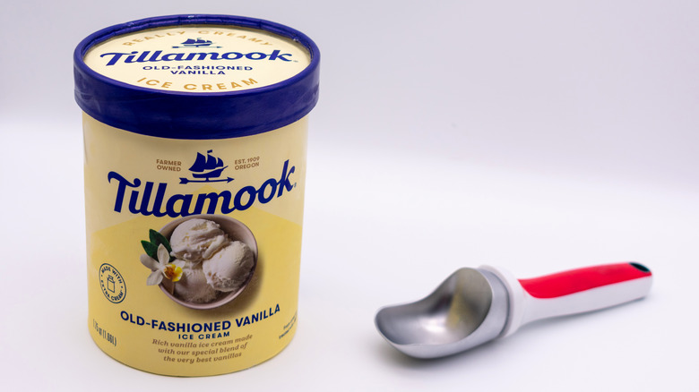 container of tillamook old-fashioned vanilla ice cream with an ice cream scoop