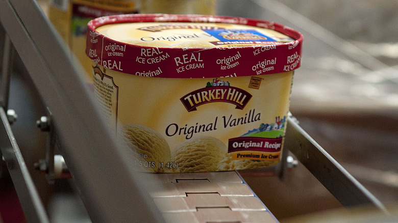 package of Turkey Hill Original Vanilla Ice Cream on a conveyor belt