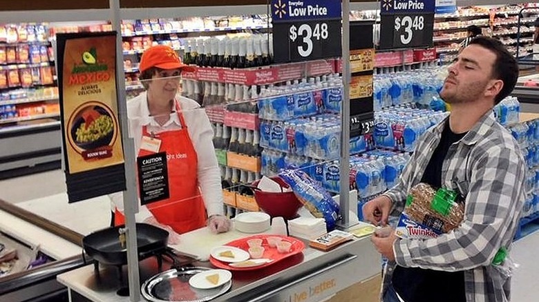 man taking Walmart samples