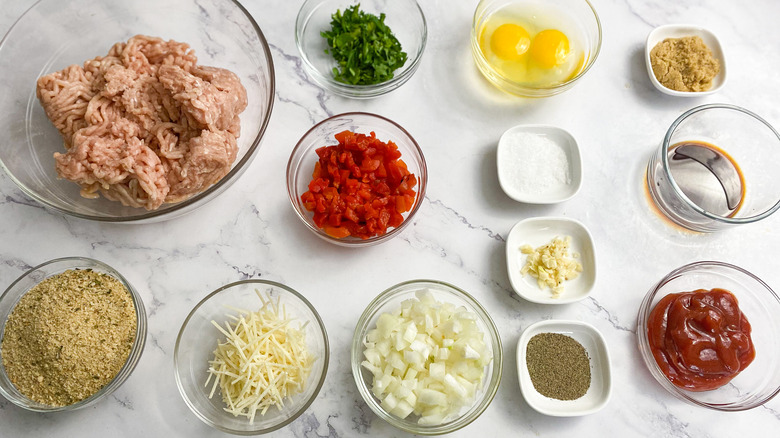 chicken meatloaf muffin ingredients in bowls on counter