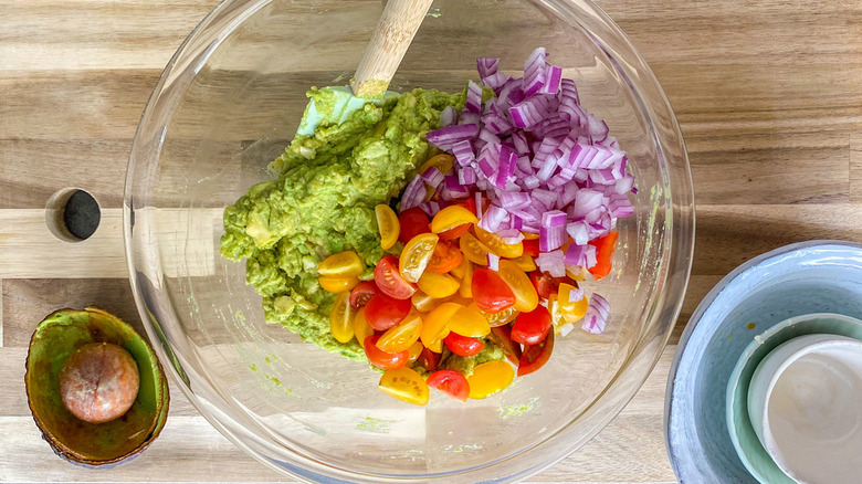 diced onions and tomatoes with avocado