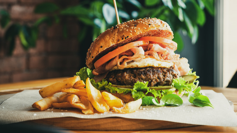 burger and fries on placemat