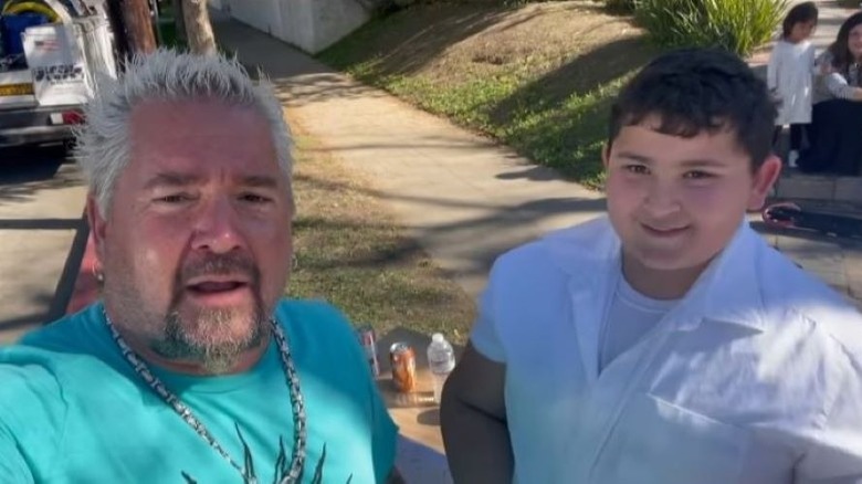 Guy Fieri encouraging kid