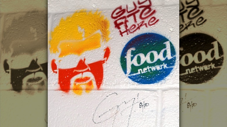 Fieri wall illustration with Food Network logo