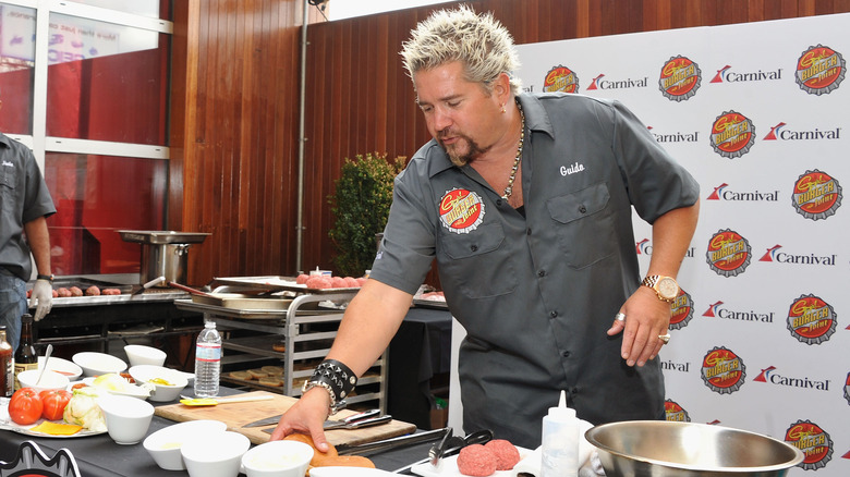 Fieri cooking at Carnival cruise press conference