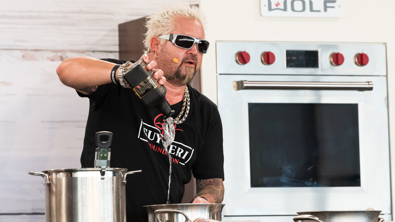 Guy Fieri in black t-shirt